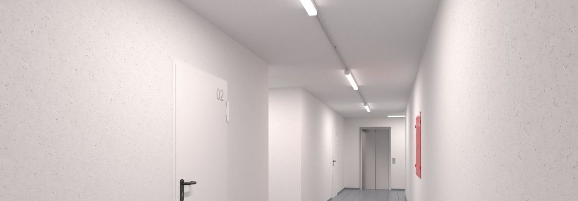 Langer Flur wie in einem Bürogebäude mit Deckenbeleuchtung des Herstellers